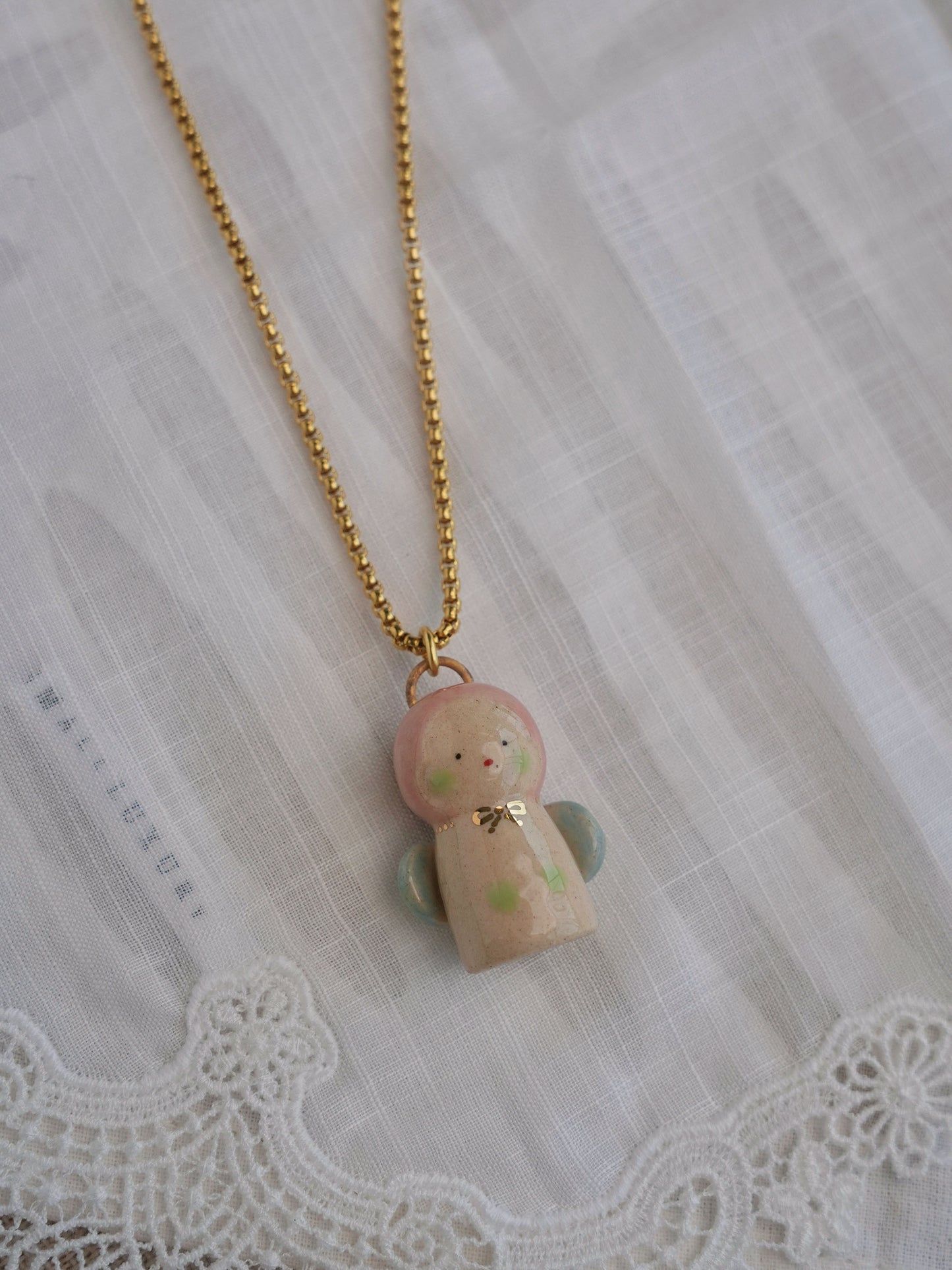 Baby Angel Handmade Gilded Relief Ceramic Pendant