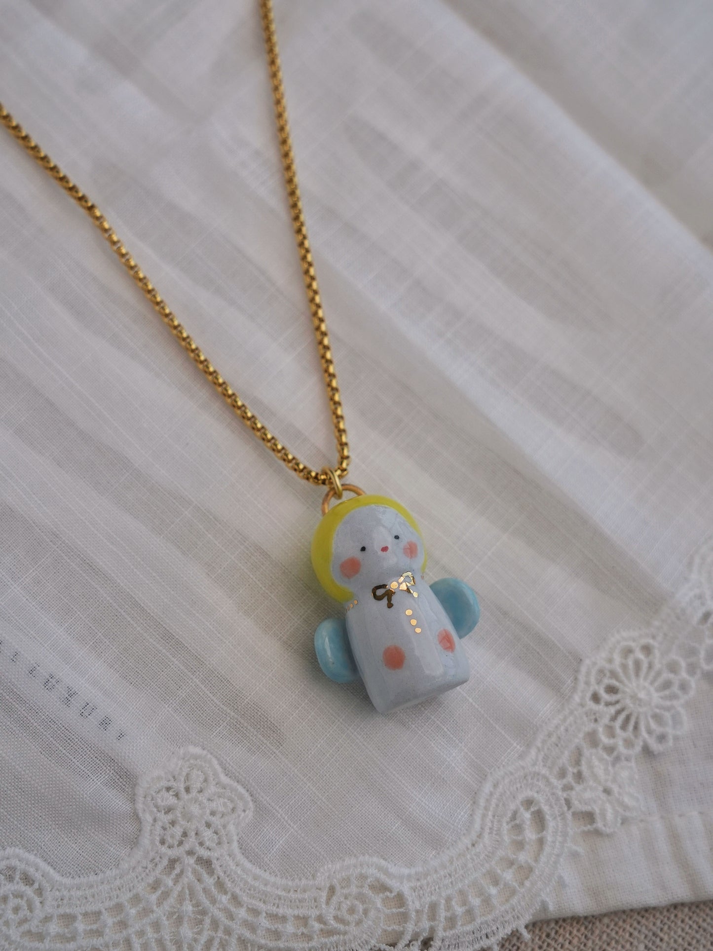 Baby Angel Handmade Gilded Relief Ceramic Pendant