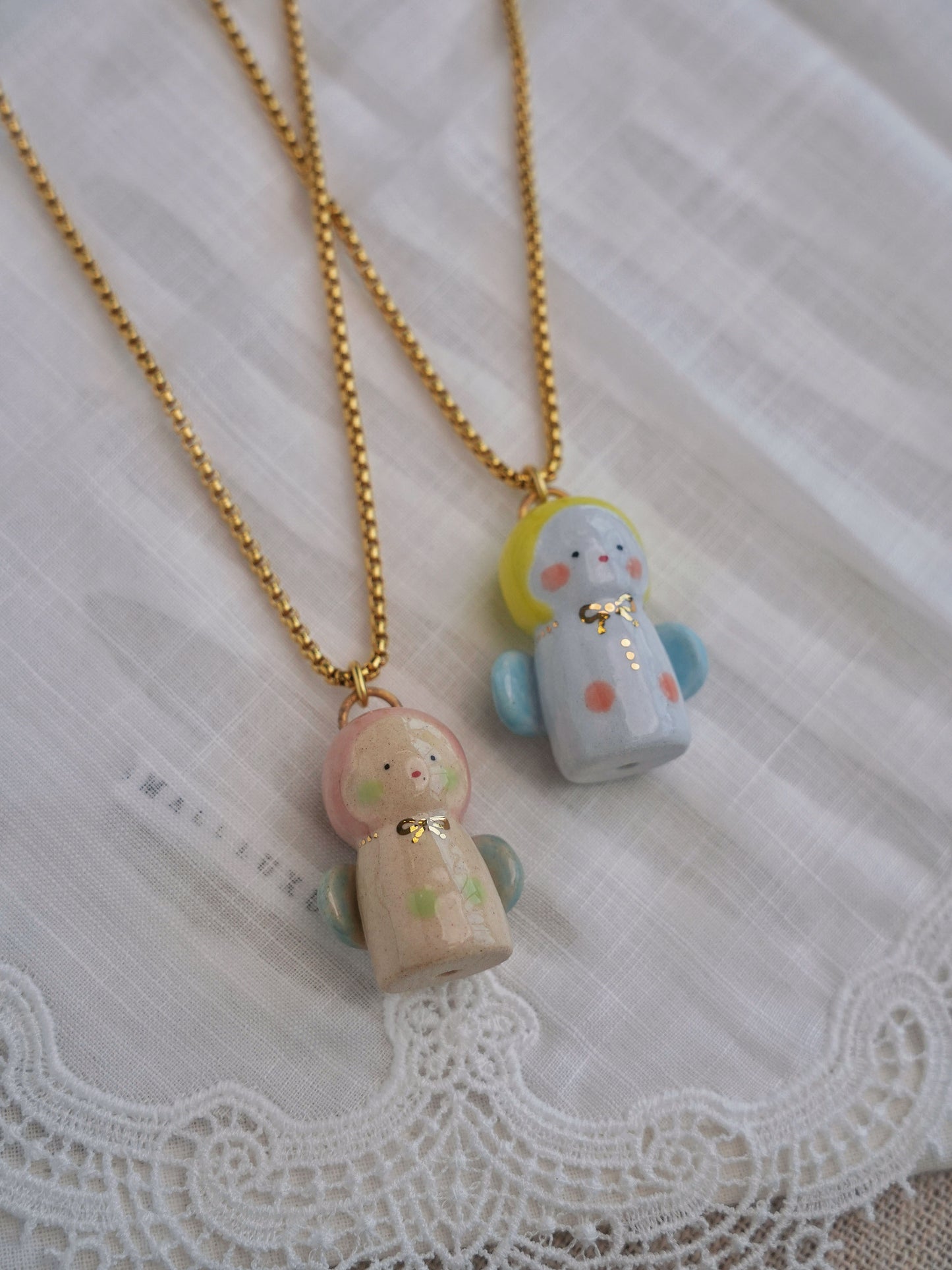 Baby Angel Handmade Gilded Relief Ceramic Pendant